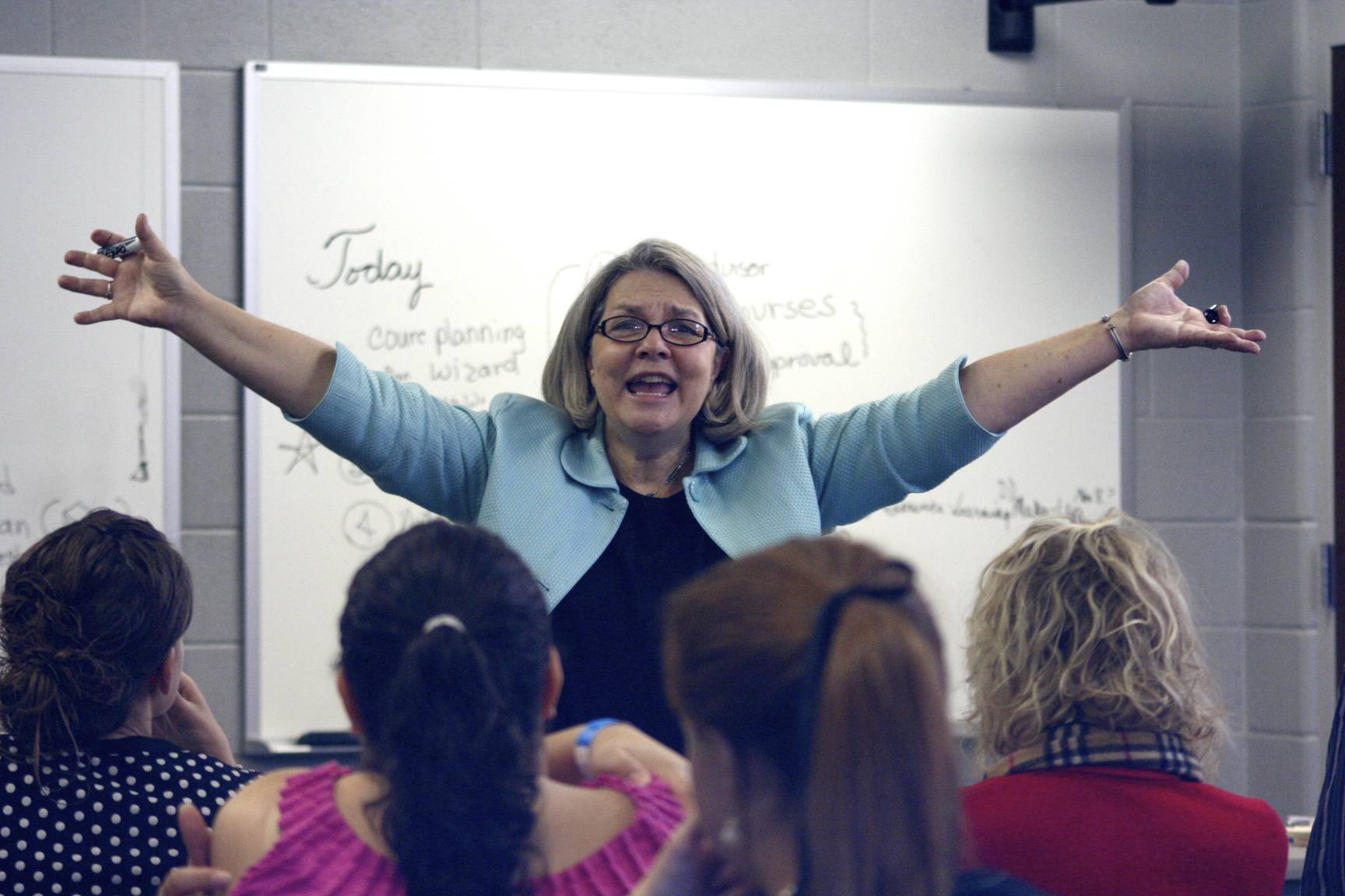 Woman professor teaching class