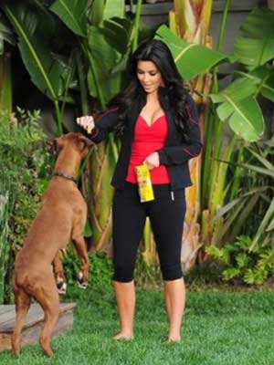 Kim Playing With Her Dog